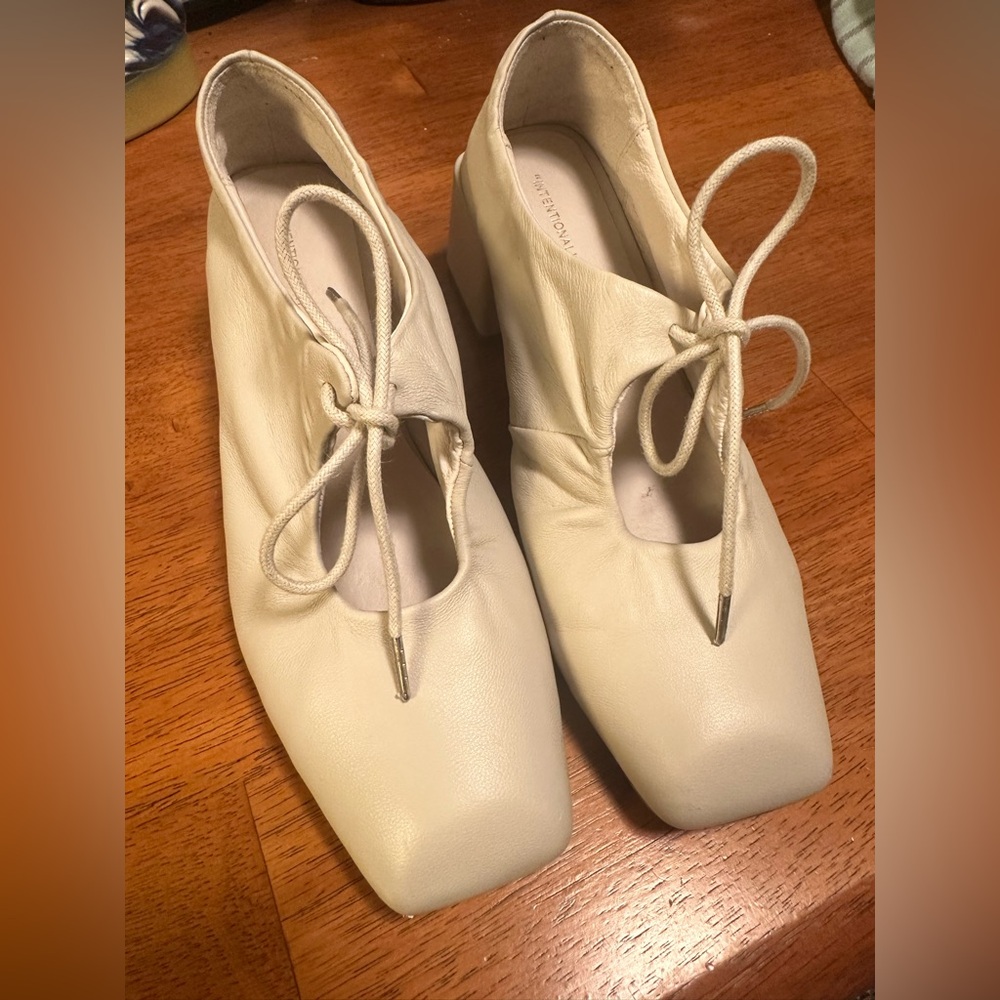 INTENTIONALLY BLANK Cream Heels Minimalist Design